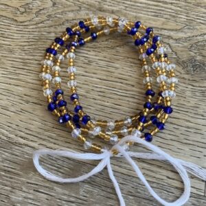 Blue, gold, and clear beaded waist beads.