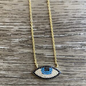 Gold chain with evil eye pendant.