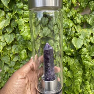 Amethyst crystal water bottle with a lid.