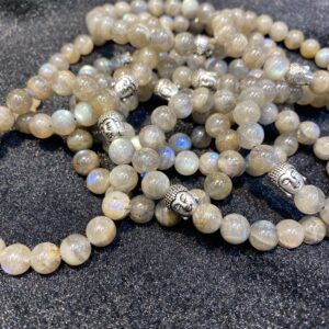 Gray gemstone bracelets with Buddha heads.