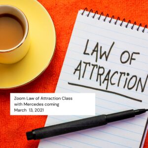 Law of Attraction written on a notepad.