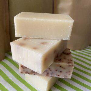 Stack of four handmade soap bars.