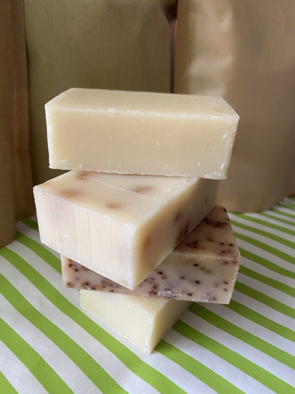 Stack of four handmade soap bars.