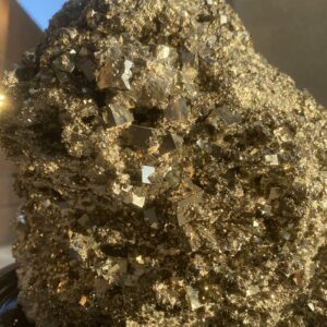 A close up of some rocks with gold in them