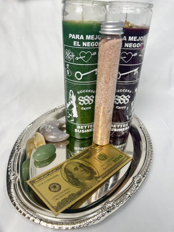 A tray with some money and cigarettes on it