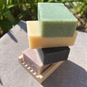 Three different soaps stacked on top of each other.