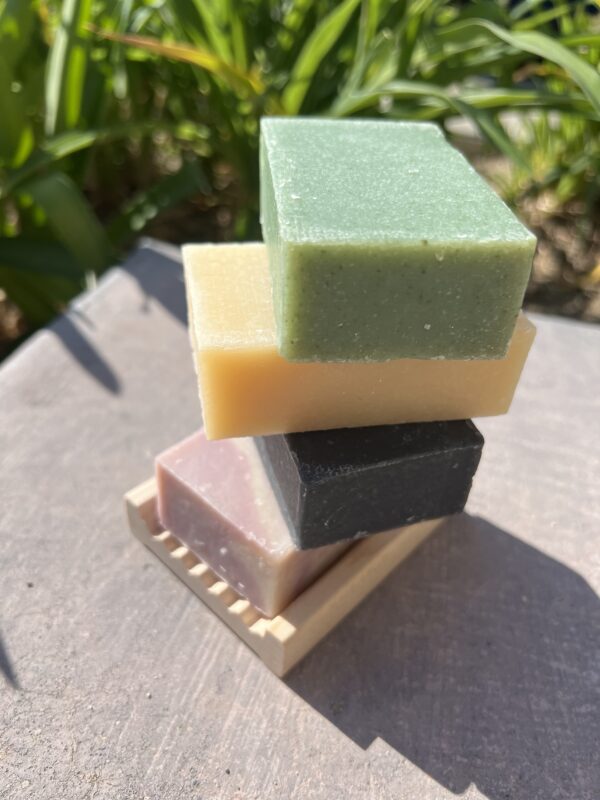 Three different soaps stacked on top of each other.