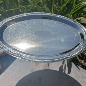 A silver tray sitting on top of a table.