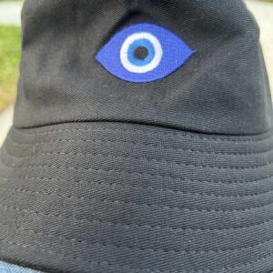 A close up of the eye on a hat