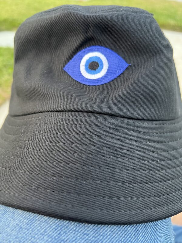 A close up of the eye on a hat