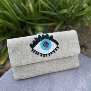 A close up of an eye on a purse