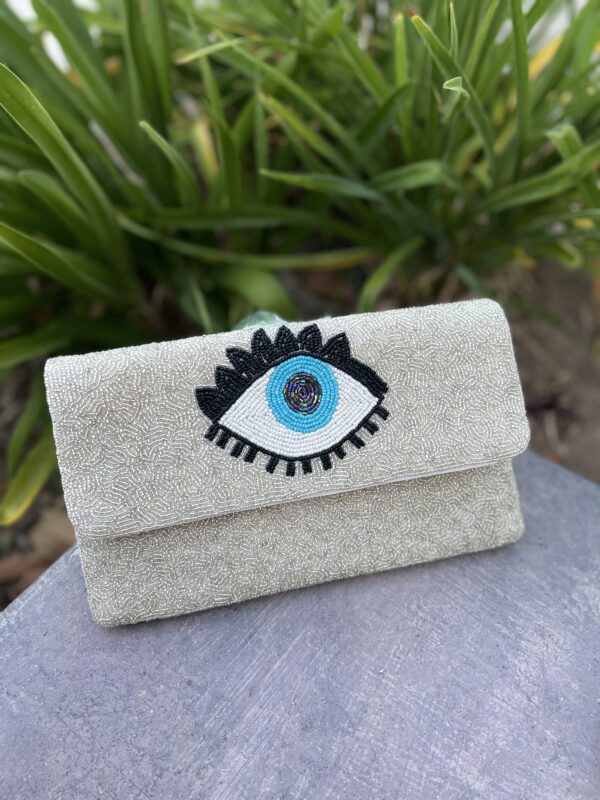 A close up of an eye on a purse