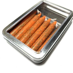 A metal container with carrots in it.