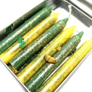 A tray of cucumbers with different colors and shapes.