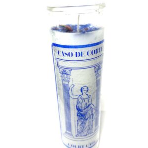 A candle with the image of a man in blue and white.