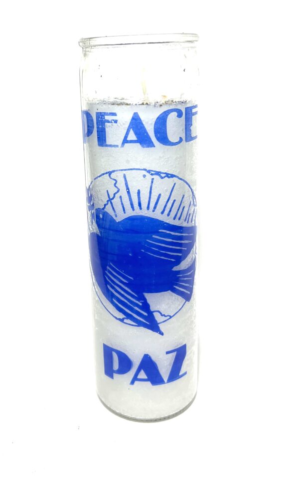 A candle that says peace and paz