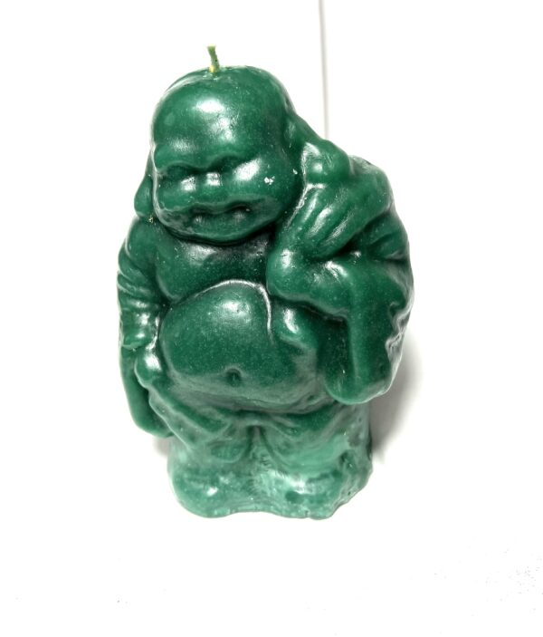 A green candle that is shaped like a buddha.