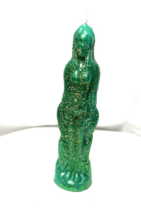 A green statue of a woman with long hair.