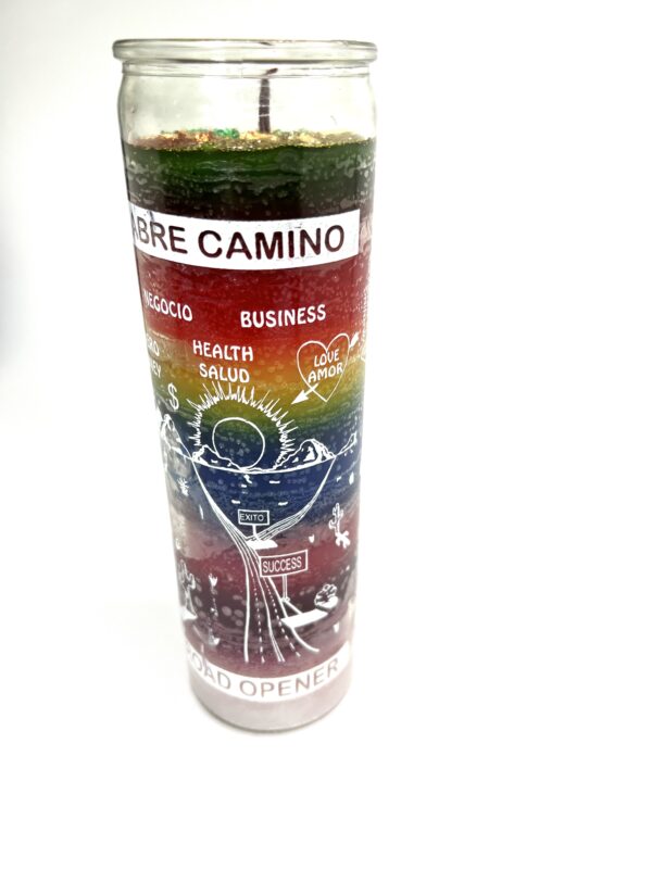 A candle with the words " camino de santiago ".