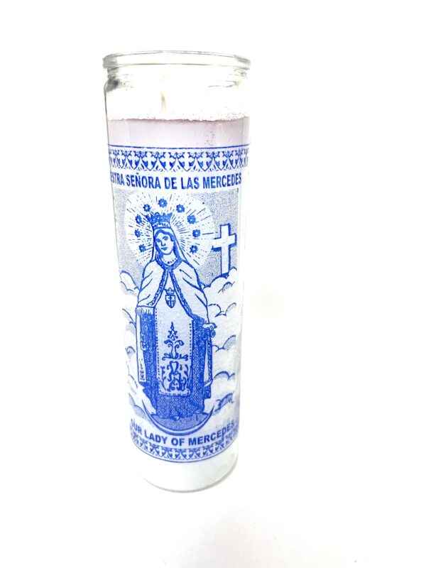 A blue and white candle with the image of jesus