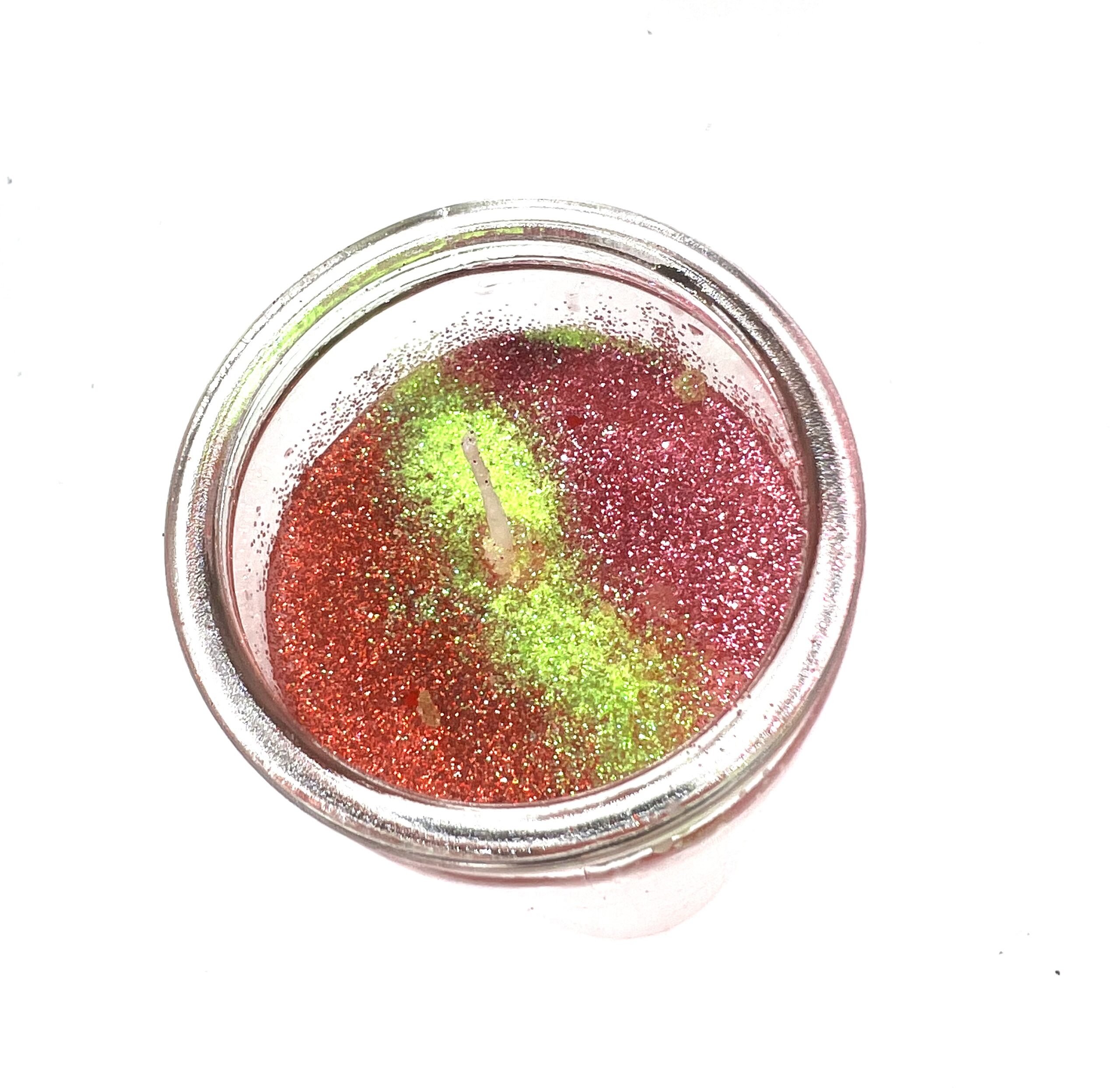 A jar of red and green sand