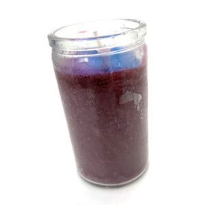 A candle that is sitting on the table.