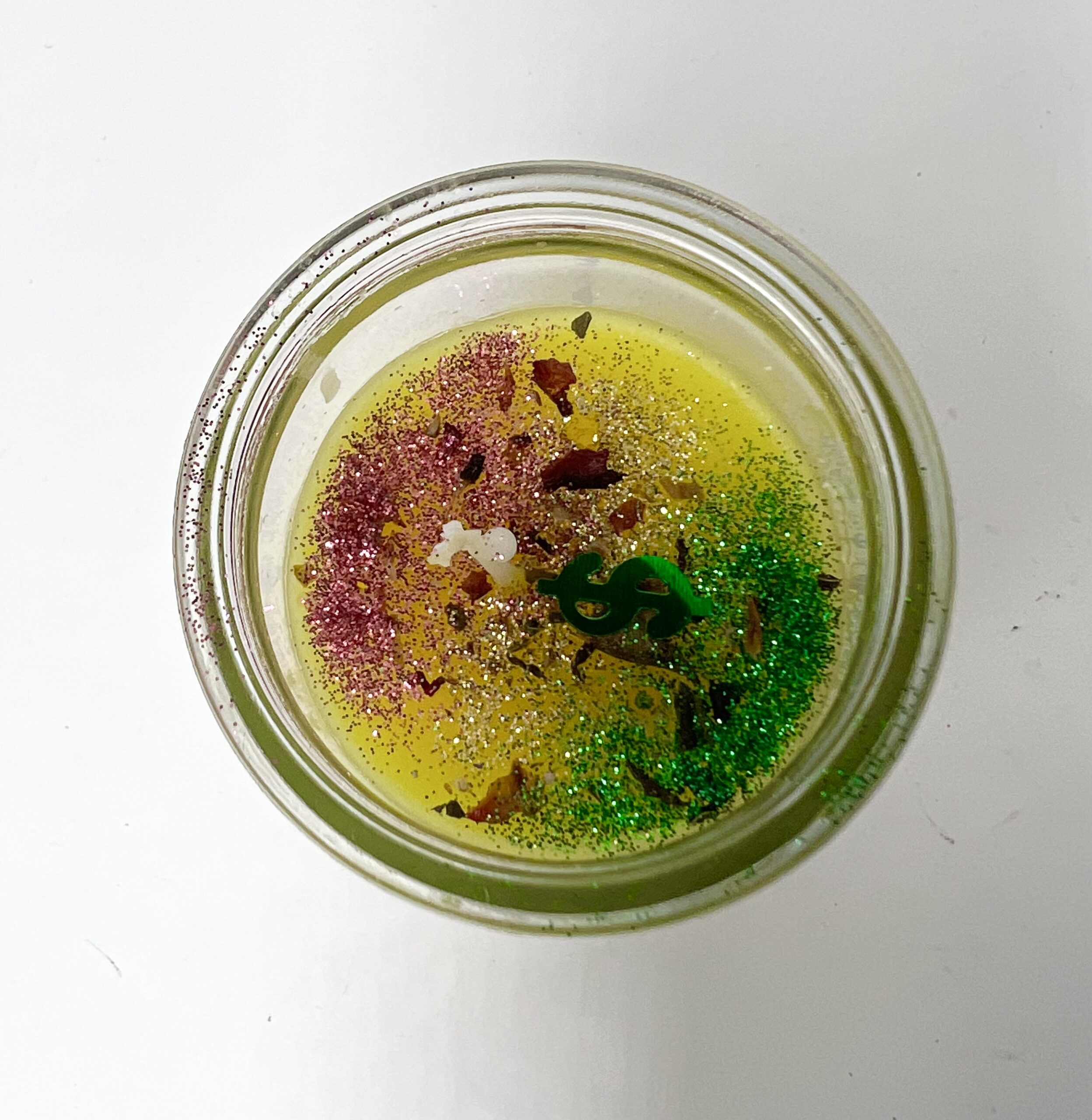 A jar of food with some kind of colorful stuff inside