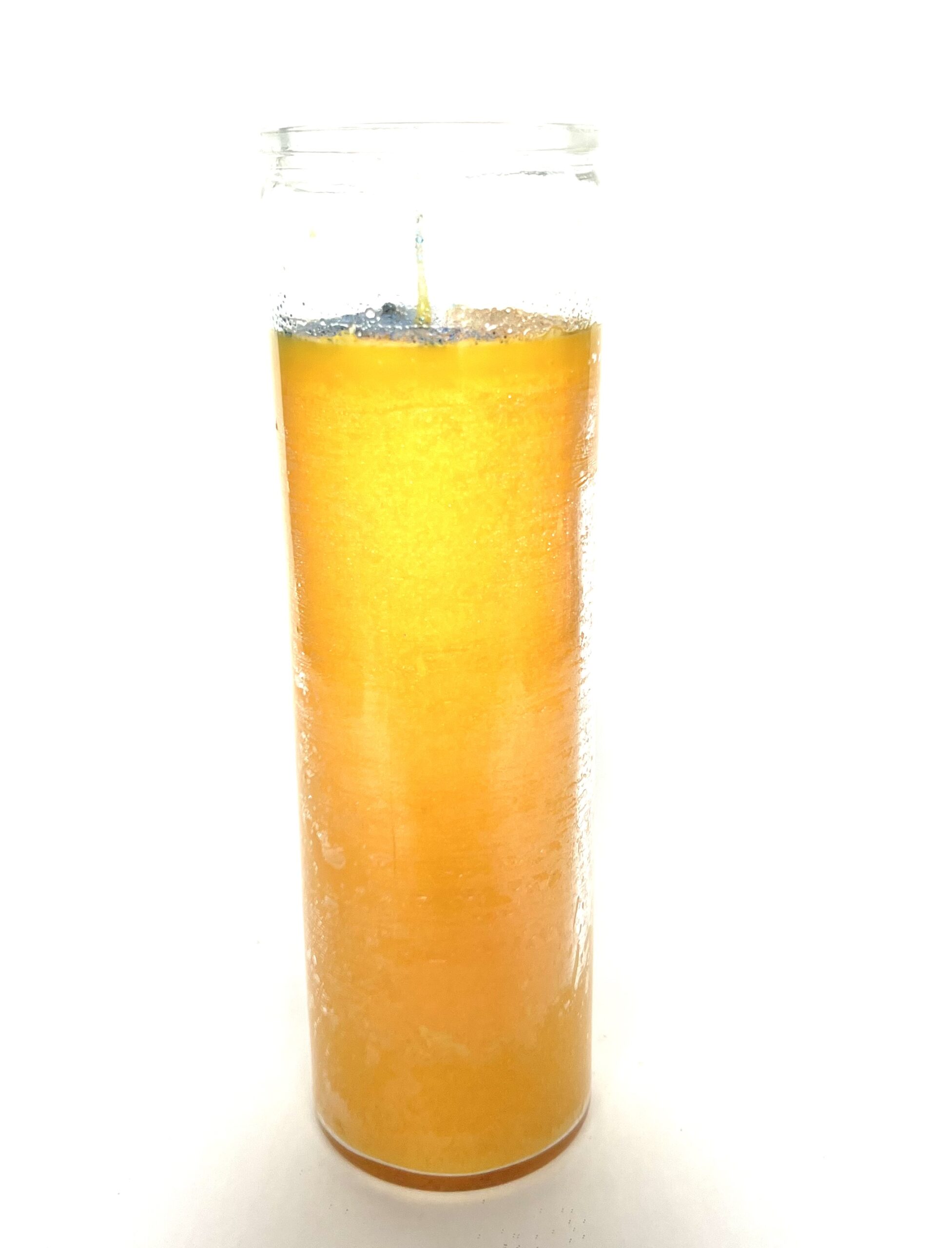 A tall glass of orange juice with a straw.