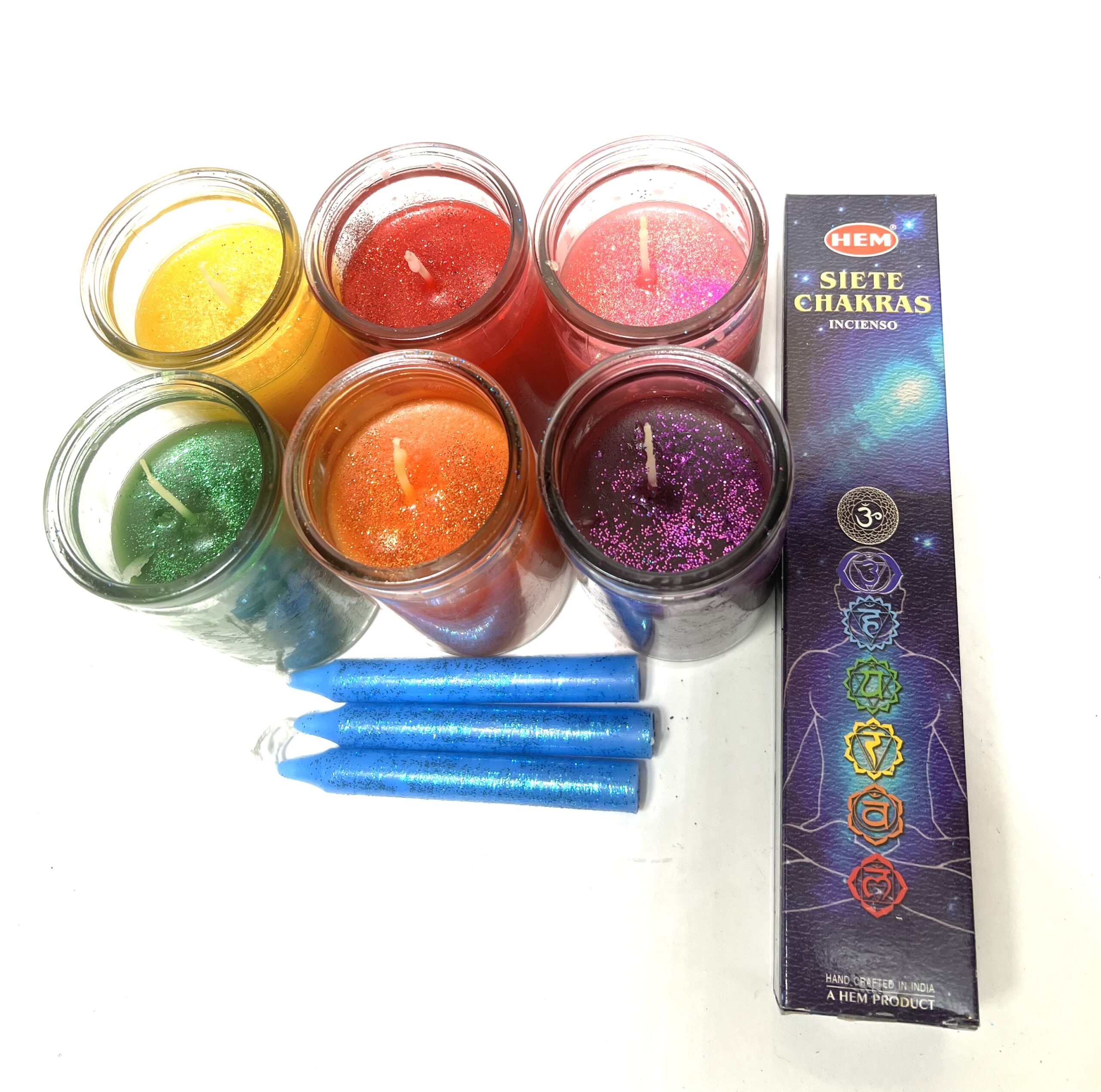 A set of candles and a box with the name chakra on it.