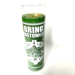 A green candle with the words " bring customers ".
