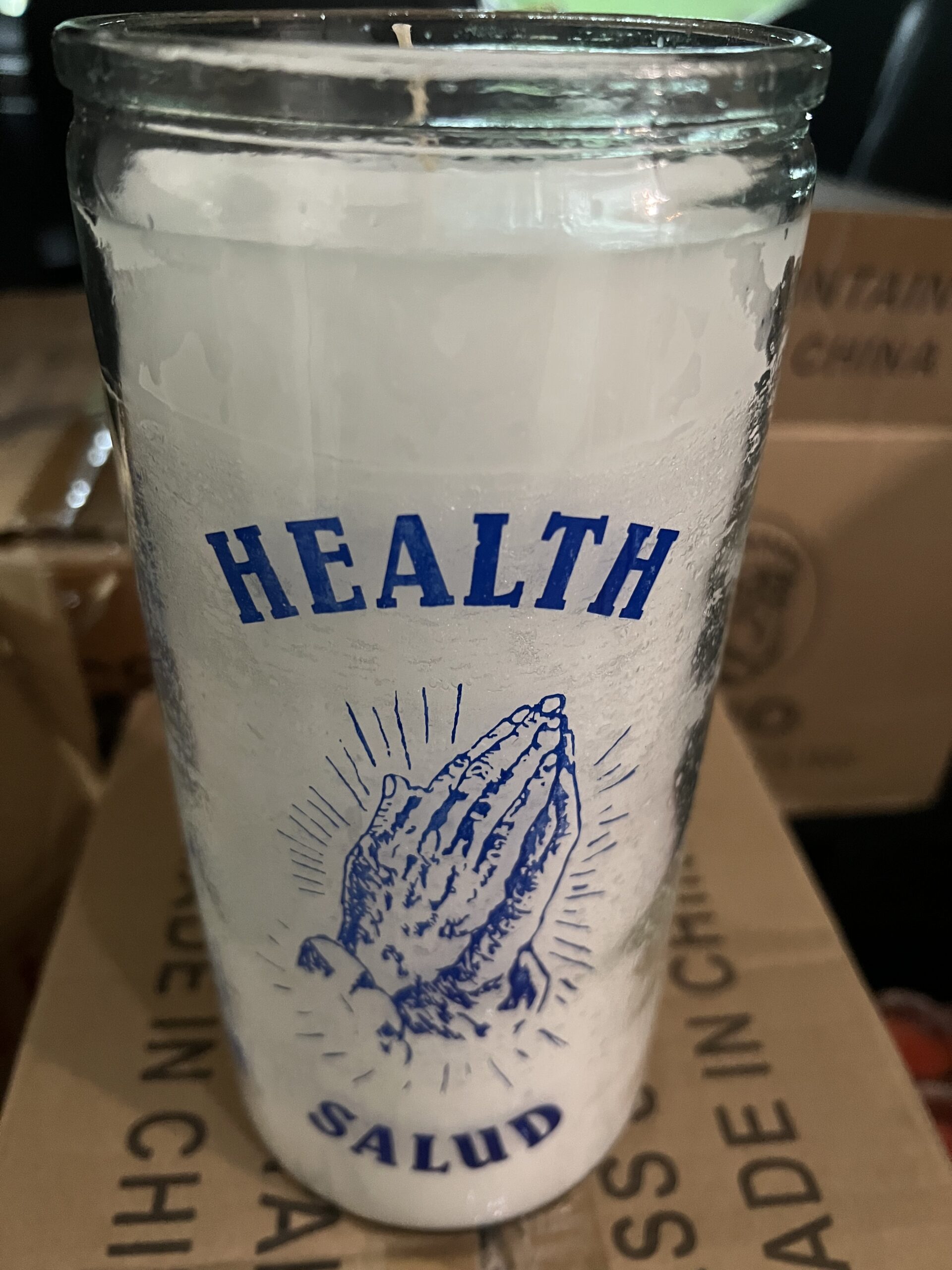 A glass with the word health written on it.