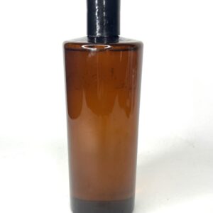Tall amber glass bottle with black cap against white background.